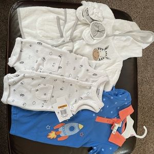 New with tags baby lot. 0-3 and 6-9mos. Baby boy.